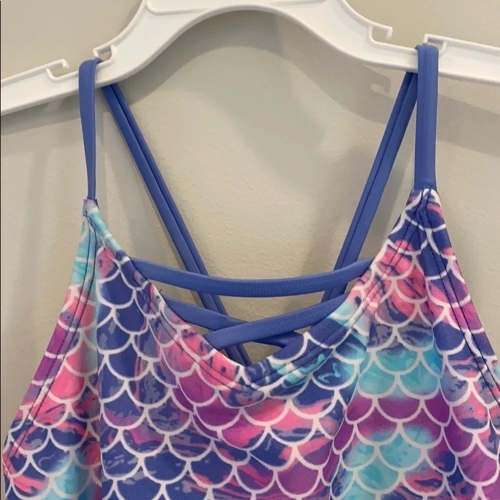 More than Magic girls one piece bathing suit.  Size large